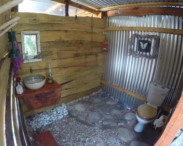 Rustic outdoor bathroom.